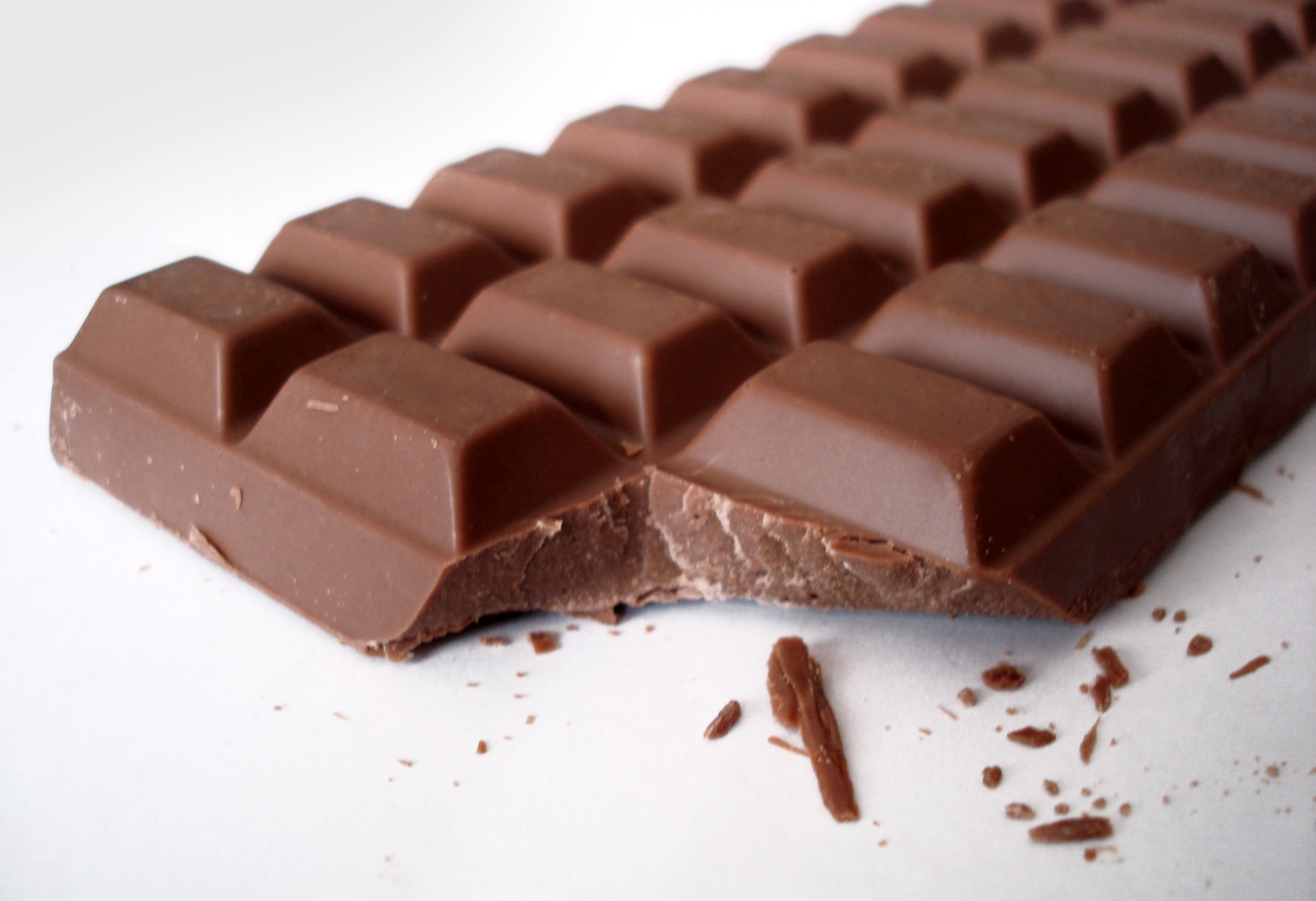 Шоколад п. Плитка шоколада. Кусочки шоколада. Шоколадка картинка. Кусок шоколада.